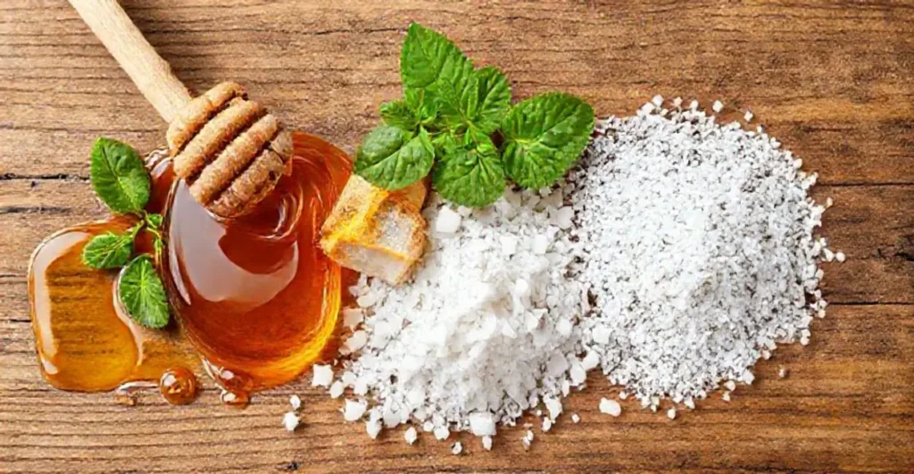 Vários adoçantes naturais dispostos artisticamente sobre uma mesa de madeira